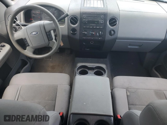 2006 Ford F-150 STX with VIN 1FTRX12W16NA23681, listed as a Copart auction lot 61585435 with 197,243 mi miles and Salvage title. Bid and sale history available at DreamBid. Image 8.