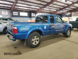 2002 Ford Ranger XL Fleet with VIN 1FTZR45E22TA06974, listed as a Copart auction lot 58312585 with 156,828 mi miles and Salvage title. Bid and sale history available at DreamBid. Image 3.