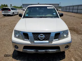 2009 Nissan Frontier SE with VIN 1N6AD07U29C400846, listed as a Copart auction lot 56419735 with 143,005 mi miles and Salvage title. Bid and sale history available at DreamBid. Image 5.