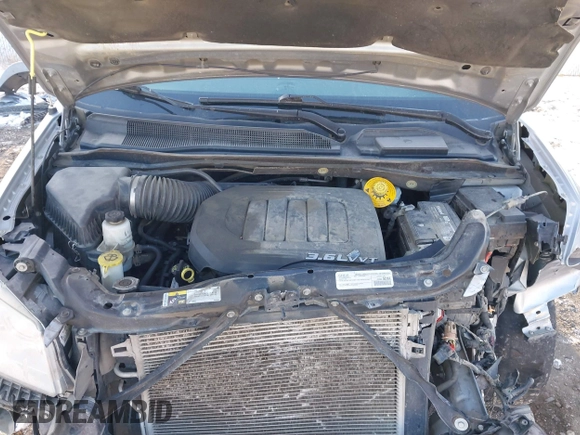 2016 Dodge Grand Caravan SE with VIN 2C4RDGBG3GR367182, listed as a IAAI auction lot 40988072 with 157,338 mi miles and . Bid and sale history available at DreamBid. Image 10.
