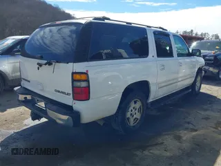 2005 Chevrolet Suburban Z71 with VIN 3GNFK16Z05G283414, listed as a IAAI auction lot 41656483 with 185,501 mi miles. Bid and sale history available at carsss.com. Image 4.