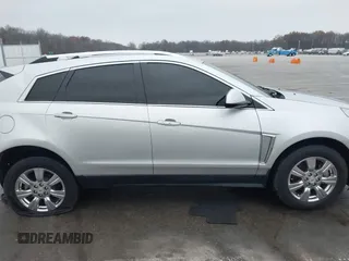 2016 Cadillac SRX Luxury Collection with VIN 3GYFNBE39GS550952, listed as a IAAI auction lot 40921325 with 90,160 mi miles. Bid and sale history available at carsss.com. Image 13.