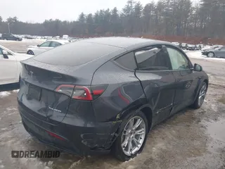 2024 Tesla Model Y Long Range with VIN 7SAYGDEE3RA239499, listed as a IAAI auction lot 41632887 with Not Provided miles. Bid and sale history available at carsss.com. Image 4.