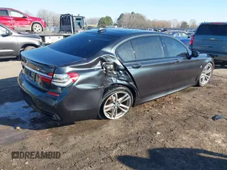 2016 BMW 7 Series 740i с VIN WBA7E2C53GG547930, выставлен на аукционе IAAI как лот 41691844 с пробегом 115 045 миль миль и . История ставок и продаж доступна на DreamBid. Изображение 4.