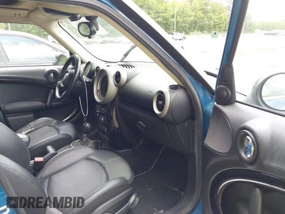 2012 MINI Countryman S with VIN WMWZC3C51CWL81251, listed as a IAAI auction lot 42452794 with 113,865 mi miles and . Bid and sale history available at DreamBid. Image 5.