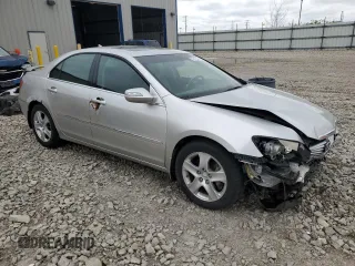 2005 Acura RL z VIN JH4KB16515C011475, wystawiony jako Copart lot #57517545 z przebiegiem 254 459 mil mil oraz Nie do naprawy. Historia ofert i sprzedaży dostępna na DreamBid. Obrazek 4.