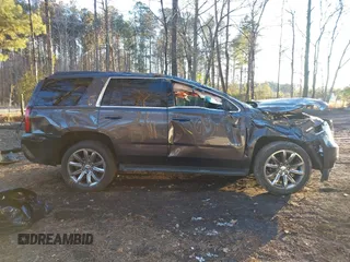 2018 Chevrolet Tahoe LT with VIN 1GNSKBKC7JR234467, listed as a IAAI auction lot 41276741 with 132,327 mi miles and . Bid and sale history available at DreamBid. Image 14.