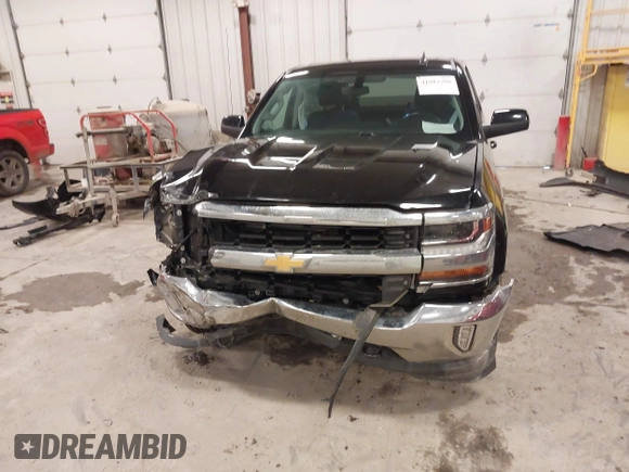 2016 Chevrolet Silverado 1500 LT with VIN 1GCVKREC5GZ176474, listed as a IAAI auction lot 41983780 with 118,587 mi miles and . Bid and sale history available at DreamBid. Image 6.