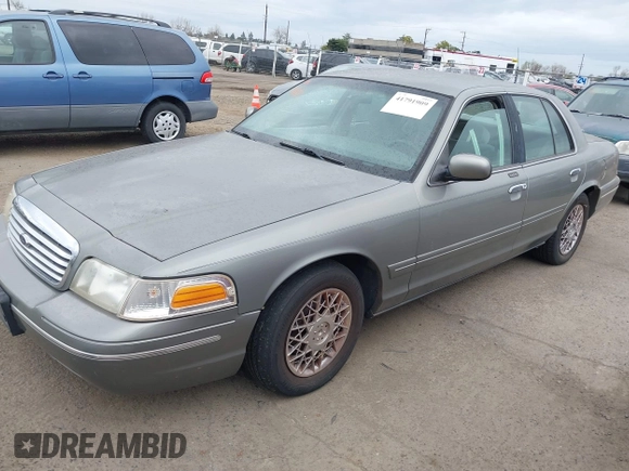 1999 Ford Crown Victoria LX z VIN 2FAFP74W4XX192490, wystawiony jako IAAI lot #41791909 z przebiegiem 115 469 mil mil oraz . Historia ofert i sprzedaży dostępna na DreamBid. Obrazek 2.