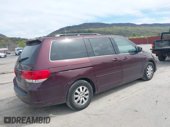 2008 Honda Odyssey EX-L with VIN 5FNRL38748B402957, listed as a IAAI auction lot 42092761 with 142,927 mi miles. Bid and sale history available at carsss.com. Image 4.