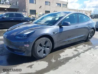 2023 Tesla Model 3 with VIN 5YJ3E1EA0PF698076, listed as a IAAI auction lot 41744362 with 12,838 mi miles. Bid and sale history available at carsss.com. Image 2.