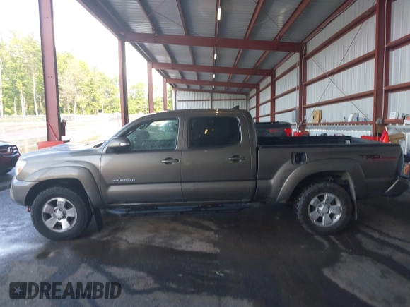 2014 Toyota Tacoma with VIN 3TMMU4FN4EM072128, listed as a IAAI auction lot 42479725 with 287,877 mi miles and . Bid and sale history available at DreamBid. Image 14.