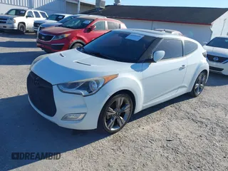 2014 Hyundai Veloster with VIN KMHTC6AD5EU193136, listed as a IAAI auction lot 41836596 with 160,460 mi miles. Bid and sale history available at carsss.com. Image 2.