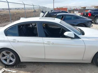 2014 BMW 3 Series 328i with VIN WBA3C1C59EK108868, listed as a IAAI auction lot 41108653 with Not Provided miles and . Bid and sale history available at carsss.com. Image 13.