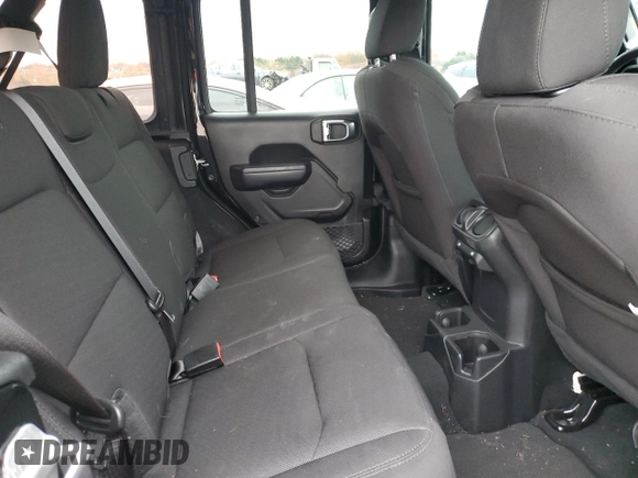 2023 Jeep Wrangler Sport S with VIN 1C4HJXDN1PW596242, listed as a Copart auction lot 82020314 with 30,061 mi miles and Salvage title. Bid and sale history available at DreamBid. Image 11.