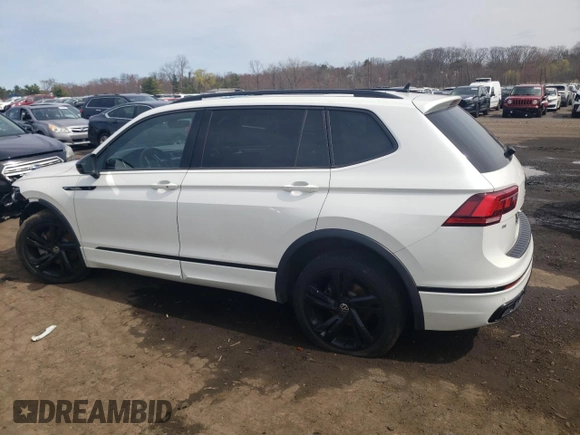 2023 Volkswagen Tiguan SE R-Line Black with VIN 3VV8B7AX9PM092316, listed as a Copart auction lot 51892325 with 24,058 mi miles and Salvage title. Bid and sale history available at DreamBid. Image 2.