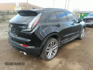 2021 Cadillac XT4 AWD Sport with VIN 1GYFZFR48MF009552, listed as a IAAI auction lot 41743125 with 53,982 mi miles and . Bid and sale history available at DreamBid. Image 4.