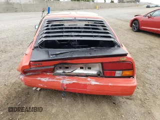 1984 Nissan 300ZX z VIN JN1CZ14SXEX009648, wystawiony jako Copart lot #56090024 z przebiegiem 48 776 mil mil oraz Szkody całkowita. Historia ofert i sprzedaży dostępna na DreamBid. Obrazek 6.