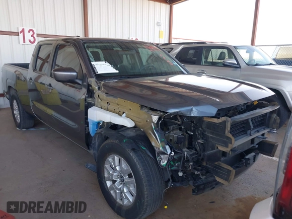 2023 Nissan Frontier SV with VIN 1N6ED1FJ9PN671676, listed as a IAAI auction lot 41668838 with 22,105 mi miles and . Bid and sale history available at DreamBid. Image 14.