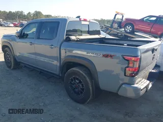 2023 Nissan Frontier Pro-4X with VIN 1N6ED1EK7PN604374, listed as a IAAI auction lot 41828936 with 60,452 mi miles and . Bid and sale history available at DreamBid. Image 3.