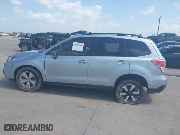 2017 Subaru Forester with VIN JF2SJABC5HH474561, listed as a IAAI auction lot 42532755 with 99,797 mi miles and . Bid and sale history available at DreamBid. Image 14.
