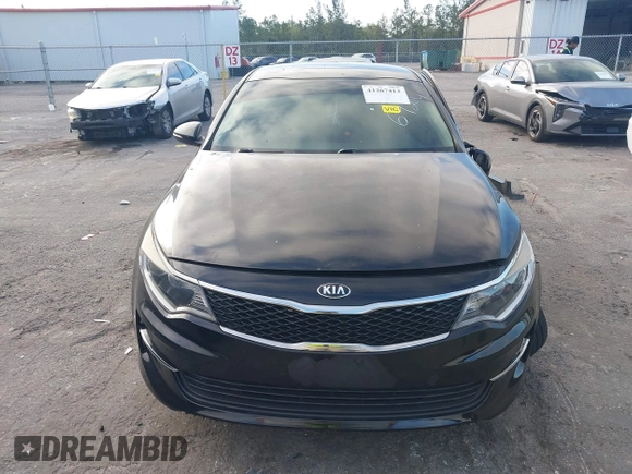 2018 Kia Optima LX with VIN 5XXGT4L38JG256924, listed as a IAAI auction lot 41267413 with 129,820 mi miles and . Bid and sale history available at DreamBid. Image 12.