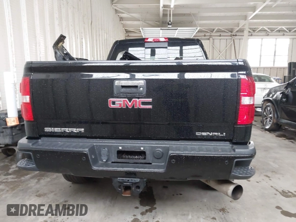 2016 GMC Sierra 2500HD Denali z VIN 1GT12UE82GF207890, wystawiony jako IAAI lot #41994971 z przebiegiem 101 221 mil mil oraz . Historia ofert i sprzedaży dostępna na DreamBid. Obrazek 16.