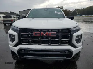 2024 GMC Canyon 4WD AT4X with VIN 1GTP6EEKXR1134879, listed as a Copart auction lot 80822964 with 12,567 mi miles and Salvage Title. Bid and sale history available at carsss.com. Image 5.