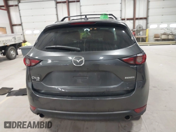 2020 Mazda CX-5 Grand Touring with VIN JM3KFBDM3L0739763, listed as a IAAI auction lot 41751250 with 88,063 mi miles and . Bid and sale history available at carsss.com. Image 16.