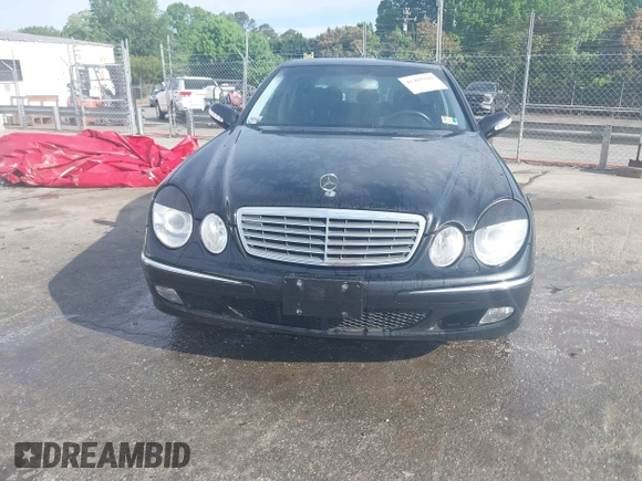 2003 Mercedes-Benz E-Class 3.2L with VIN WDBUF65J93X110625, listed as a IAAI auction lot 41485310 with 164,165 mi miles. Bid and sale history available at carsss.com. Image 12.
