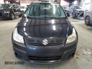 2010 Suzuki SX4 z VIN JS2YB5A36A6300326, wystawiony jako Copart lot #84372804 z przebiegiem 51 036 mil mil oraz Tytuł czysty. Historia ofert i sprzedaży dostępna na DreamBid. Obrazek 5.