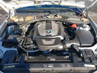 2006 BMW 6 Series 650Ci with VIN WBAEH13406CR50897, listed as a IAAI auction lot 41237283 with 98,027 mi miles. Bid and sale history available at carsss.com. Image 10.