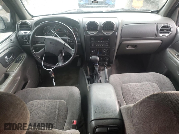 2004 GMC Envoy SLT with VIN 1GKDT13S042310076, listed as a Copart auction lot 79965854 with 220,506 mi miles and Salvage Title. Bid and sale history available at carsss.com. Image 8.