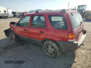 2001 Ford Escape XLS with VIN 1FMYU02161KE97828, listed as a Copart auction lot 62542154 with 186,810 mi miles and Salvage Title. Bid and sale history available at carsss.com. Image 2.