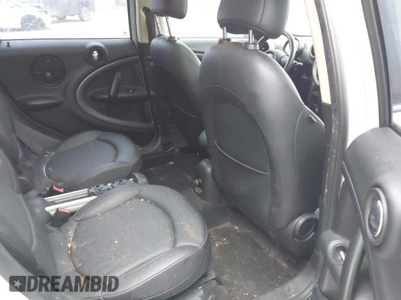2011 MINI Countryman S with VIN WMWZC3C52BWL78647, listed as a IAAI auction lot 42459886 with 142,407 mi miles and . Bid and sale history available at DreamBid. Image 8.