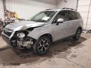 2016 Subaru Forester 2.0XT Premium with VIN JF2SJGDC4GH551225, listed as a IAAI auction lot 40831025 with 70,996 mi miles. Bid and sale history available at carsss.com. Image 18.