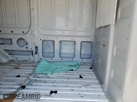2023 Ford Transit Cargo с VIN 1FTBR1C83PKB66369, выставлен на аукционе Copart как лот 56473095 с пробегом Не указан миль и Списание • Salvage title. История ставок и продаж доступна на DreamBid. Изображение 10.