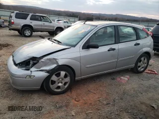 2004 Ford Focus with VIN 3FAFP37Z94R105076, listed as a Copart auction lot 82924224 with 218,253 mi miles and Clean title. Bid and sale history available at DreamBid. Image 1.