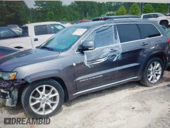 2015 Jeep Grand Cherokee Summit with VIN 1C4RJFJG0FC611768, listed as a IAAI auction lot 42468497 with 217,032 mi miles and . Bid and sale history available at DreamBid. Image 2.