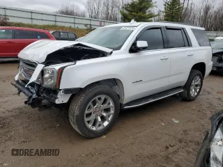 2017 GMC Yukon SLT with VIN 1GKS2BKC6HR174365, listed as a Copart auction lot 81471474 with 118,509 mi miles and Salvage Title. Bid and sale history available at carsss.com. Image 1.