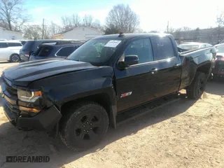 2018 Chevrolet Silverado 1500 LT with VIN 1GCVKREC9JZ256948, listed as a IAAI auction lot 41828882 with 63,209 mi miles. Bid and sale history available at carsss.com. Image 2.