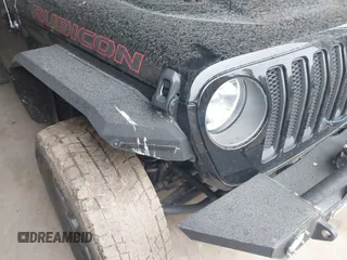 2021 Jeep Wrangler Unlimited Rubicon with VIN 1C4HJXFN2MW587168, listed as a IAAI auction lot 42472309 with 66,272 mi miles and . Bid and sale history available at DreamBid. Image 6.