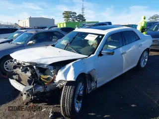 2011 Chrysler 300 with VIN 2C3CA6CT2BH537877, listed as a IAAI auction lot 41405184 with 212,027 mi miles. Bid and sale history available at carsss.com. Image 14.