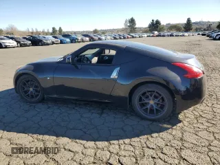 2012 Nissan 370Z Touring with VIN JN1AZ4EH4CM561432, listed as a Copart auction lot 89376935 with 128,955 mi miles and Salvage Title. Bid and sale history available at carsss.com. Image 2.