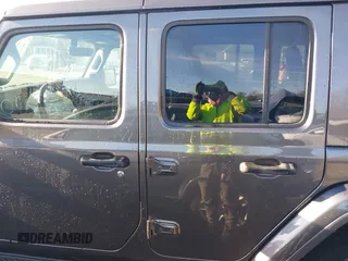 2018 Jeep Wrangler Unlimited Sahara with VIN 1C4HJXEN5JW203879, listed as a IAAI auction lot 41131467 with 87,065 mi miles and . Bid and sale history available at DreamBid. Image 14.
