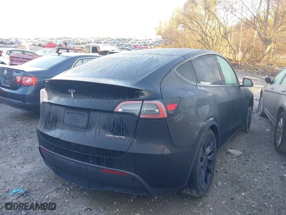 2022 Tesla Model Y Performance with VIN 7SAYGDEF3NF397671, listed as a IAAI auction lot 41459991 with NaN miles. Bid and sale history available at carsss.com. Image 4.