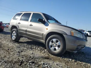 2001 Mazda Tribute LX with VIN 4F2CU08151KM28828, listed as a Copart auction lot 47933495 with 241,901 mi miles and Non Repairable. Bid and sale history available at carsss.com. Image 4.