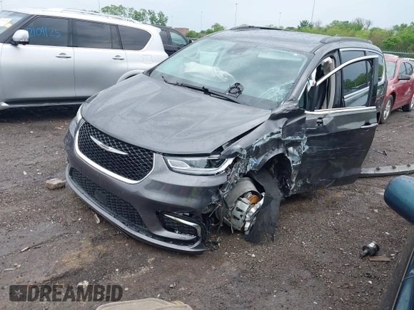 2022 Chrysler Pacifica Touring L with VIN 2C4RC1BG8NR116770, listed as a IAAI auction lot 42093616 with 98,479 mi miles and . Bid and sale history available at DreamBid. Image 17.