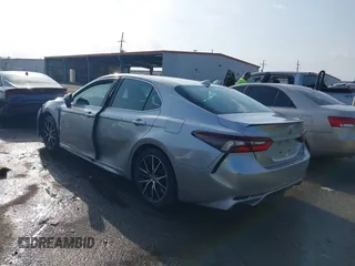 2021 Toyota Camry SE Nightshade with VIN 4T1G11AKXMU599663, listed as a IAAI auction lot 41902392 with 76,909 mi miles. Bid and sale history available at carsss.com. Image 3.