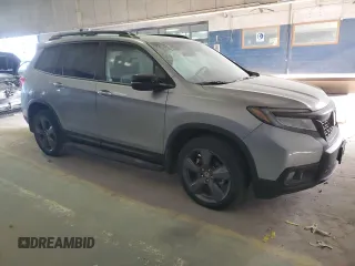 2021 Honda Passport Touring with VIN 5FNYF8H93MB010192, listed as a Copart auction lot 83013954 with Not Provided miles and Salvage Title. Bid and sale history available at carsss.com. Image 4.